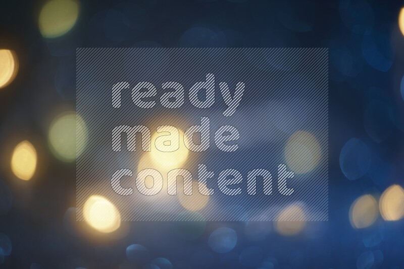 Bokeh light in yellow with blue background