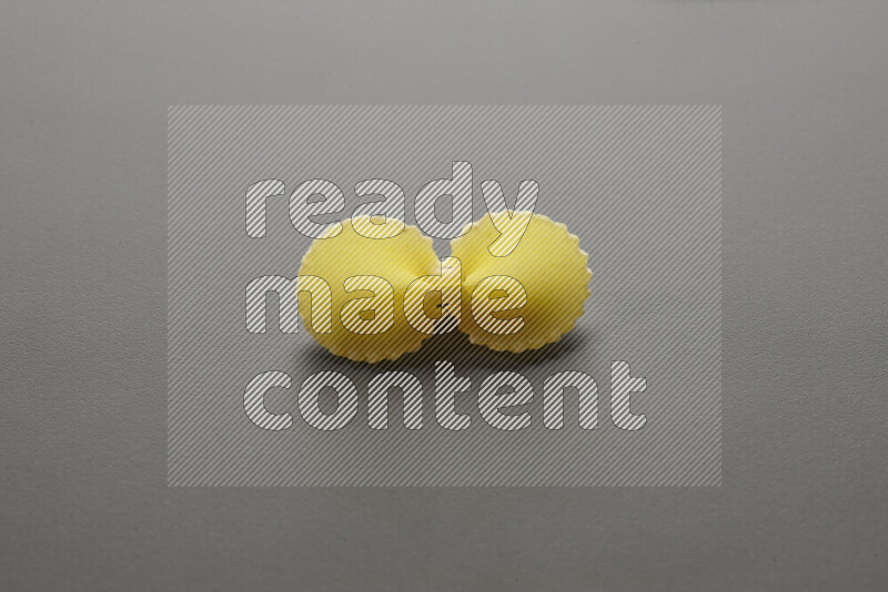 Fiocchi pasta on grey background