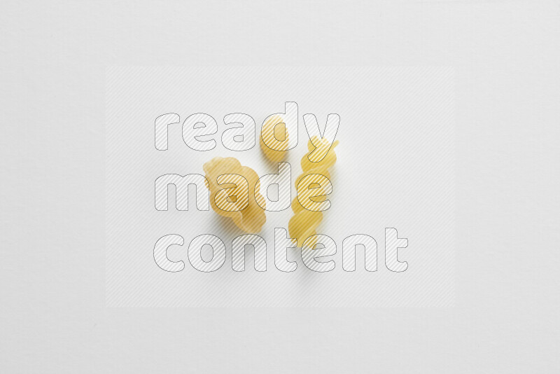 Different pasta types on white background