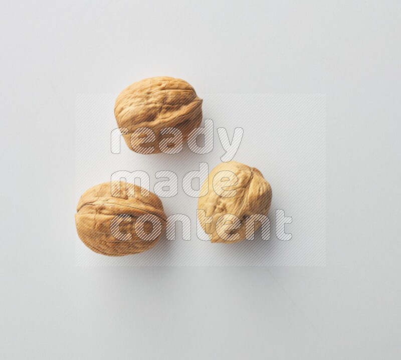 Top-view shot of walnut on white background