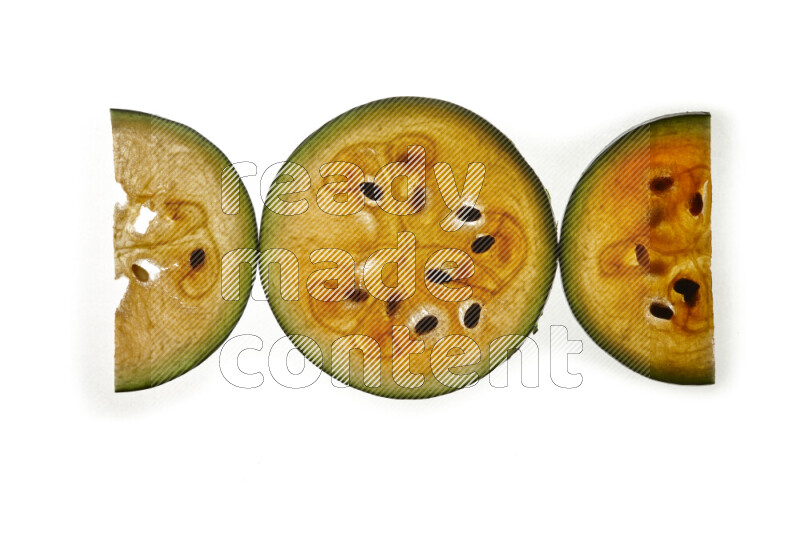 Watermelon slices on illuminated white background