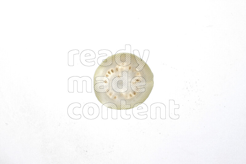 Guava slices on illuminated white background