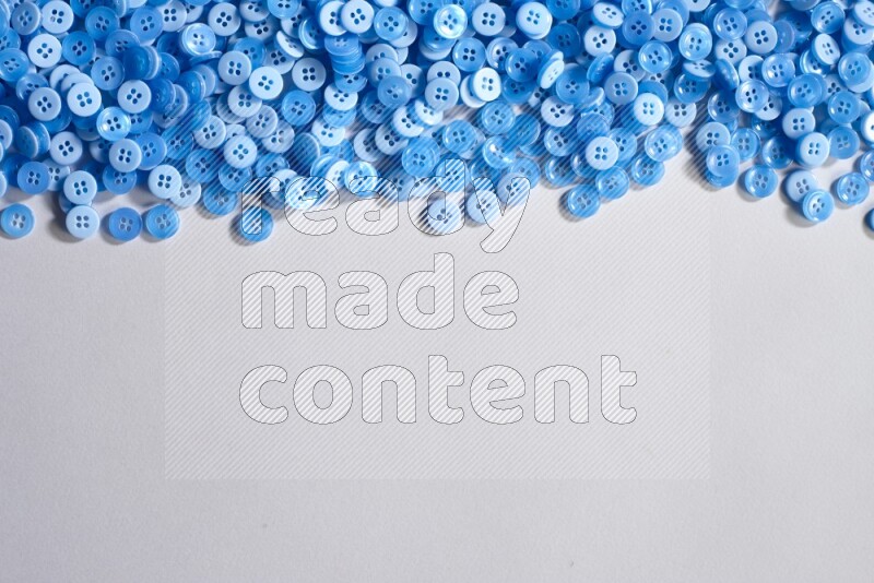 Blue buttons placed on grey background