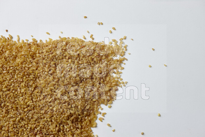 Coarse bulgur on white background