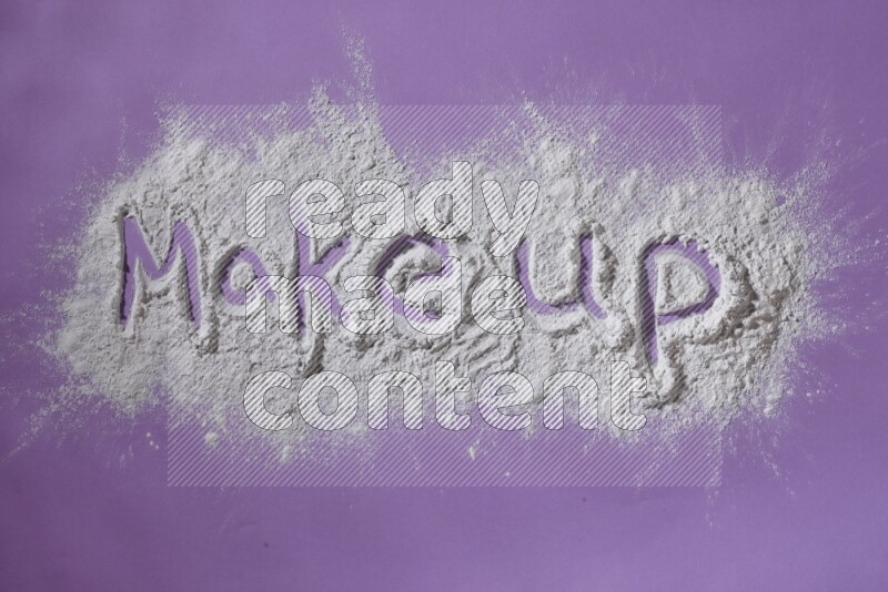 A word written with white powder on purple background