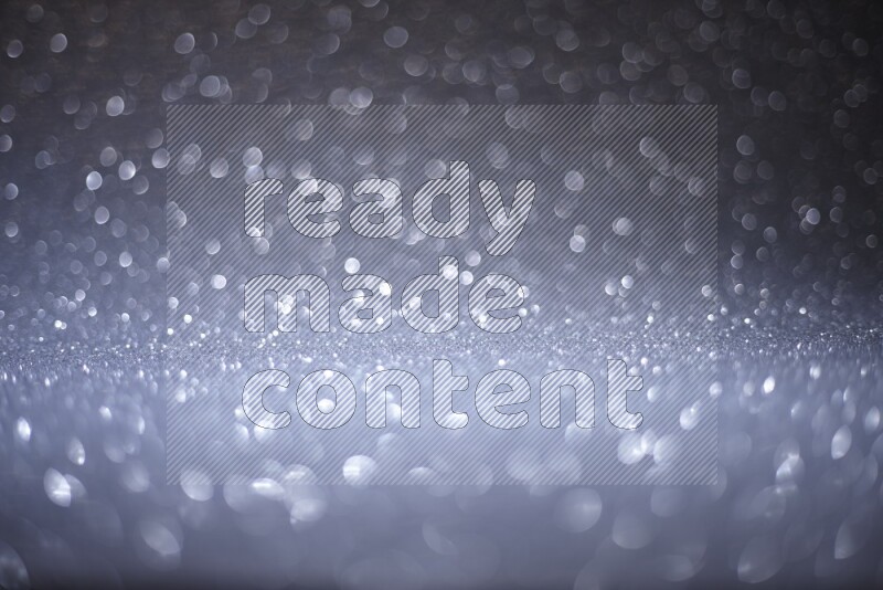 Silver glittery bokeh background