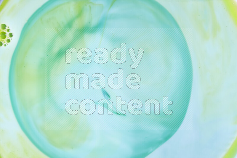 A close-up of abstract swirling patterns in green gradients