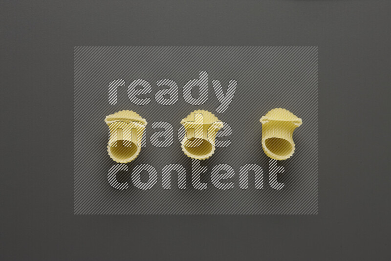 Pipe pasta on grey background