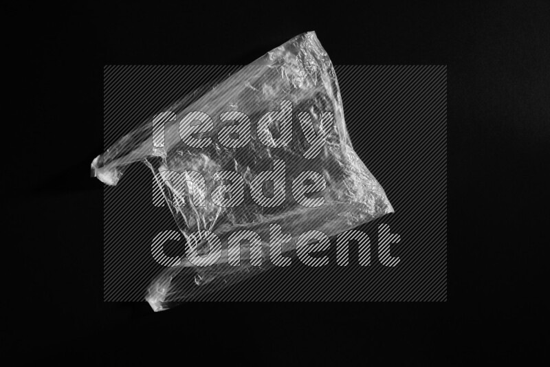 Transparent plastic textures on black background