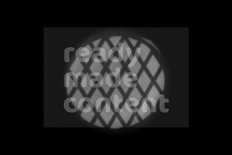 A collection of gobo light projections showcasing geometric patterns onto a smooth surface