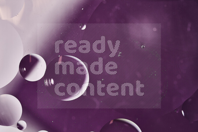 Close-ups of abstract oil bubbles on water surface in shades of white and purple