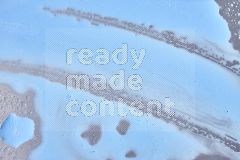 Close-ups of abstract blue paint texture in different shapes