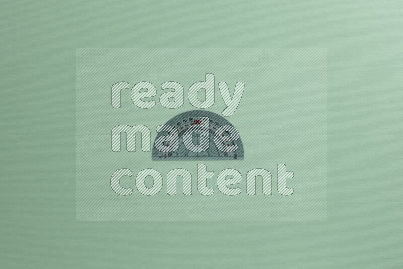 Different school supplies on green background