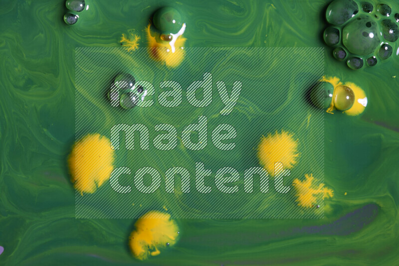 Abstract colorful background with mixed of green and yellow paint colors