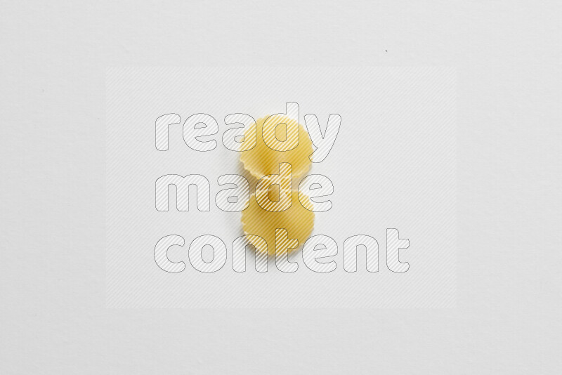 Fiocchi pasta on white background