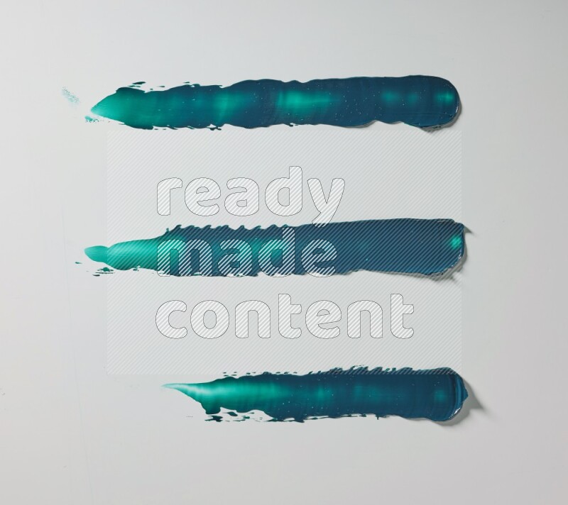Turquoise painting knife strokes on white background