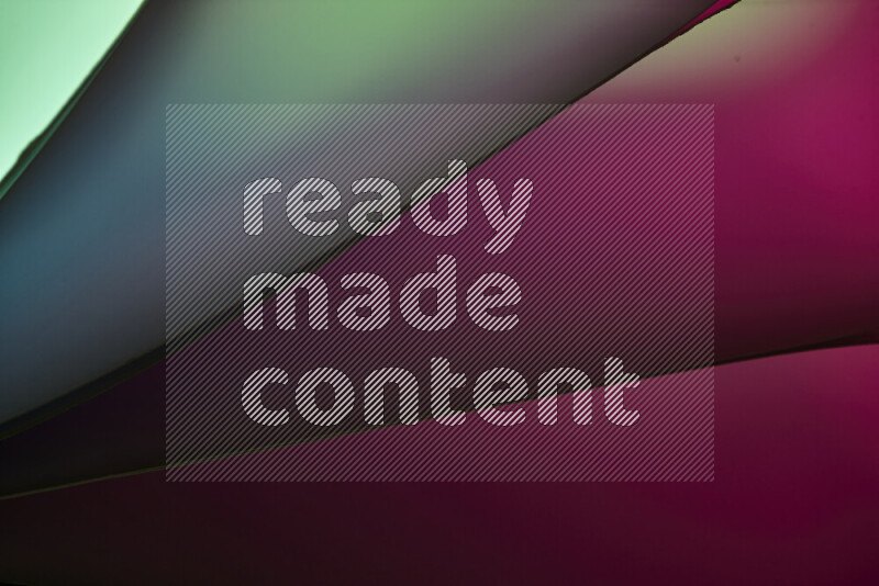 An abstract art piece displaying smooth curves in warm and cold gradients created by colored light