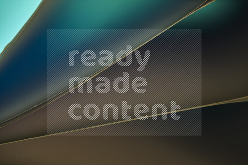 An abstract art piece displaying smooth curves in cold gradients created by colored light