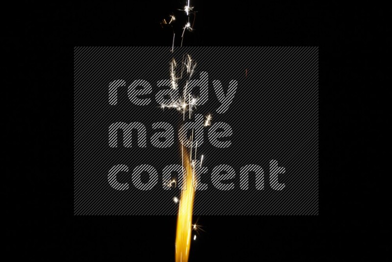 Sparkler candle isolated on black background