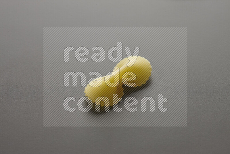 Fiocchi pasta on grey background