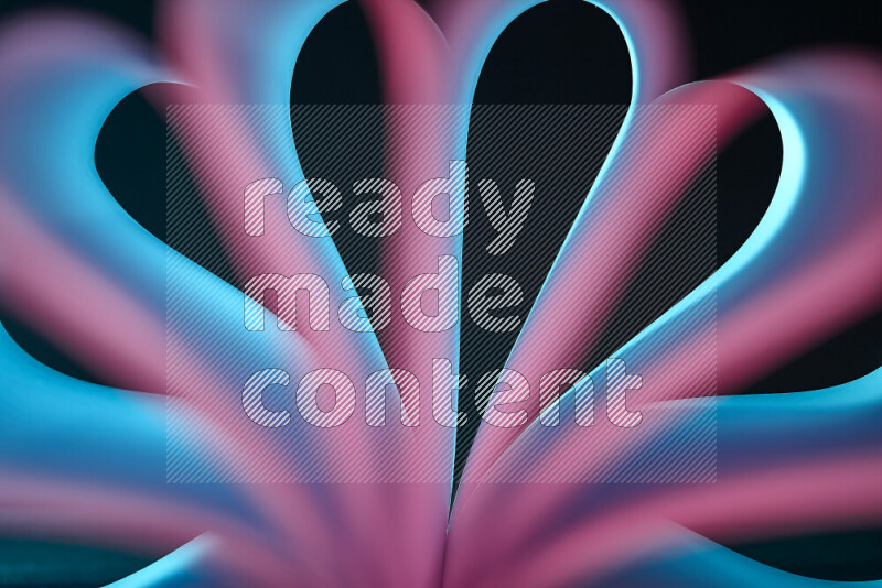 An abstract art piece displaying smooth curves in blue and pink gradients created by colored light