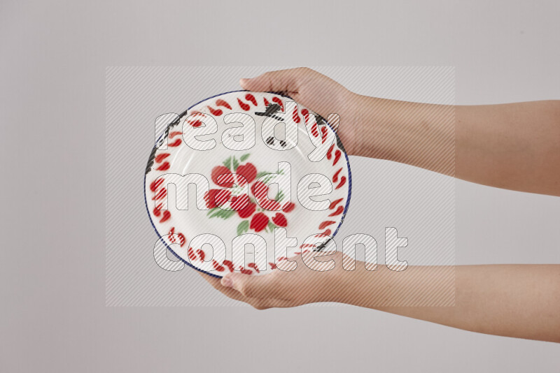 Woman hands holding different metal essentials in different positions