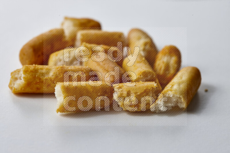Assorted snacks on white background