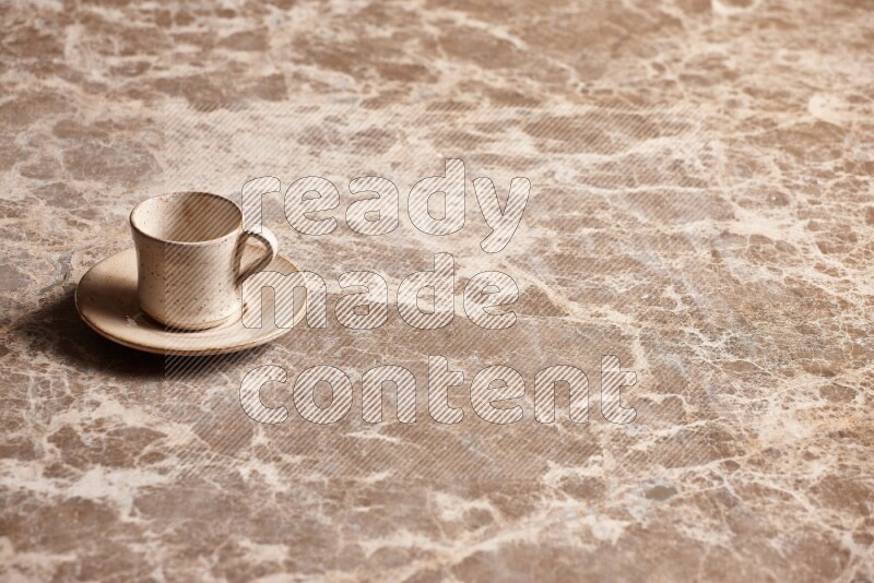 Pottery Cup on Beige Marble Flooring
