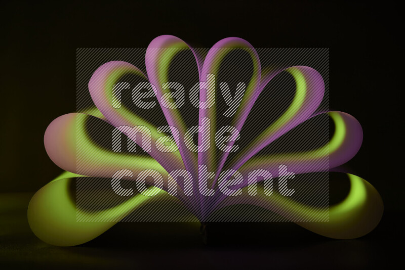 An abstract art piece displaying smooth curves in pink and green gradients created by colored light