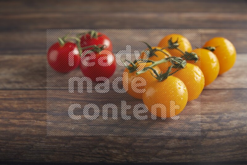 Mixed cherry tomato veins on a textured wooden background 45 degree