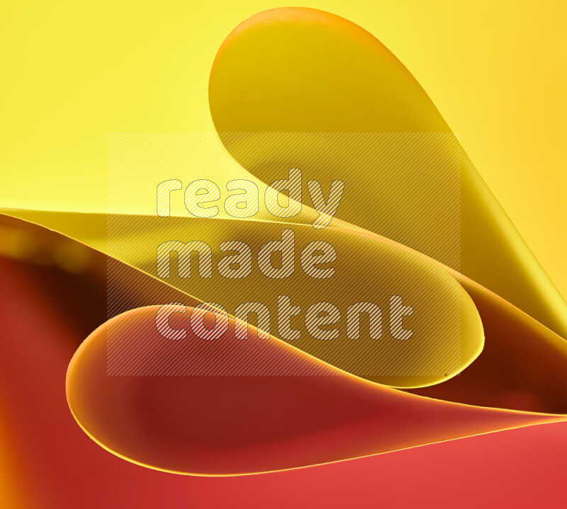 An abstract art of paper folded into smooth curves in yellow and red gradients