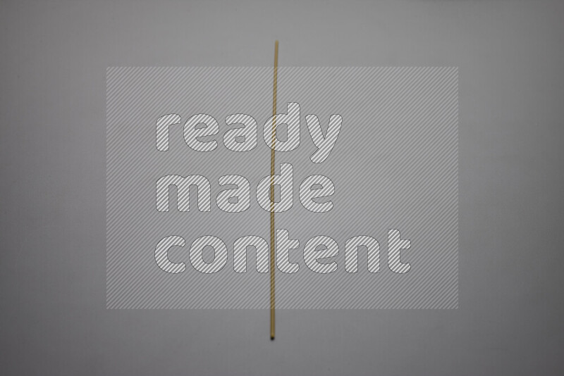 Spaghetti pasta on grey background