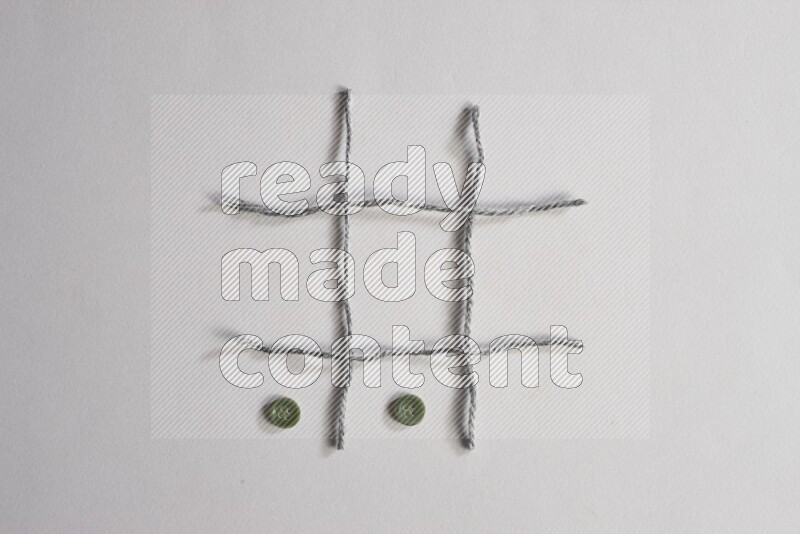 Green buttons placed on grey background