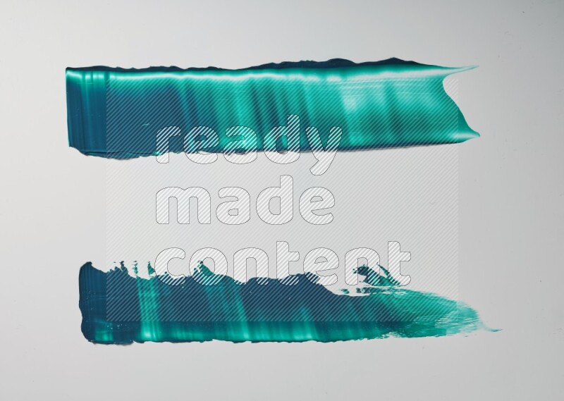 Turquoise painting knife strokes on white background