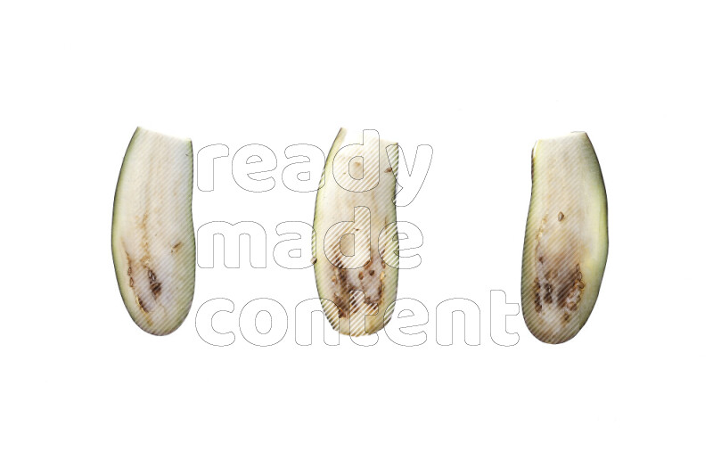 Eggplant slices on illuminated white background