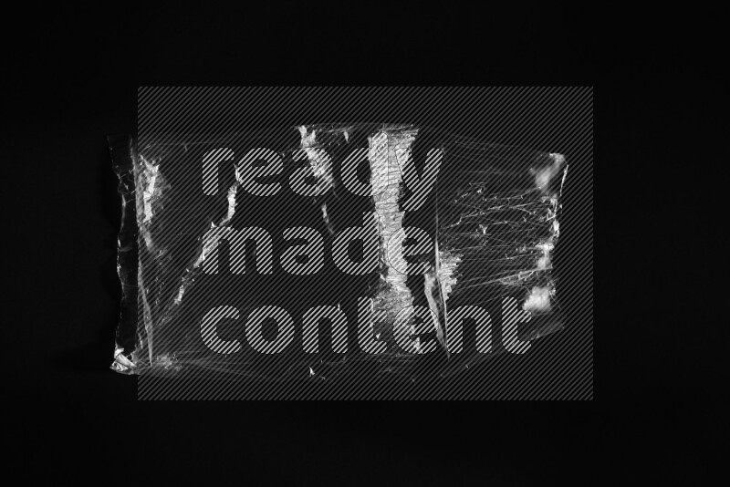 Transparent plastic textures on black background