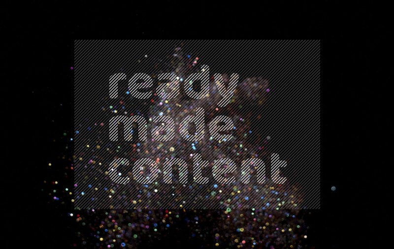 Multicolored glitter powder isolated on black background