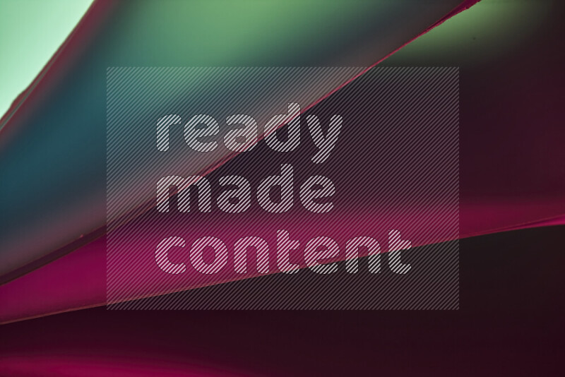 An abstract art piece displaying smooth curves in warm and cold gradients created by colored light