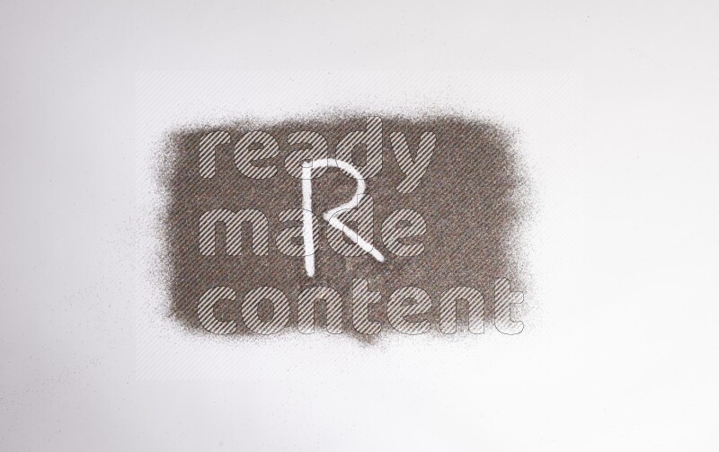 Alphabets written with glitter on white background