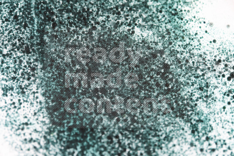 Close-ups of abstract green watercolor drops on oil Surface on white background